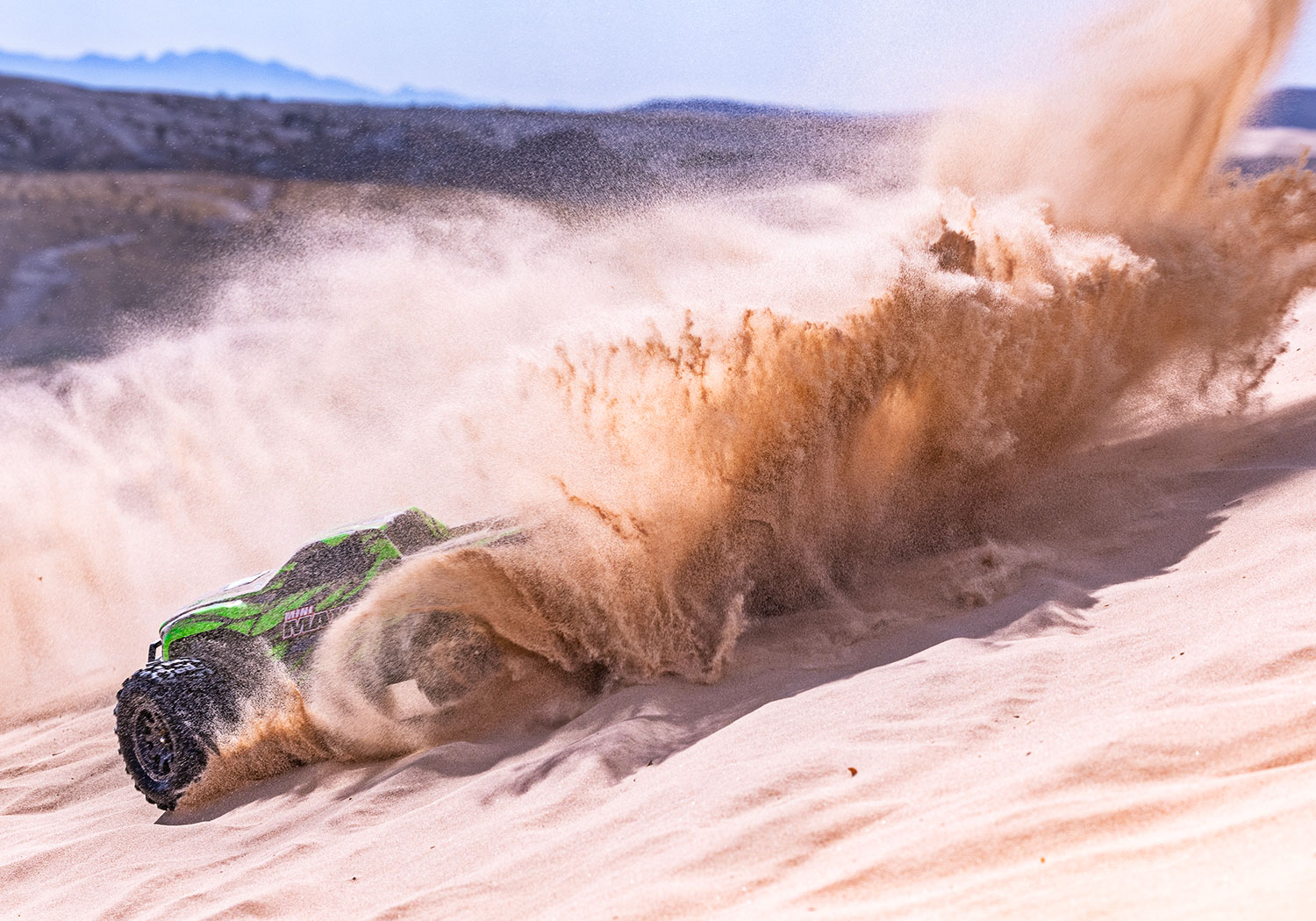 An action shot of the Mini Maxx BL-2S Ready to Run (Green) (TRA107154-1-GRN).