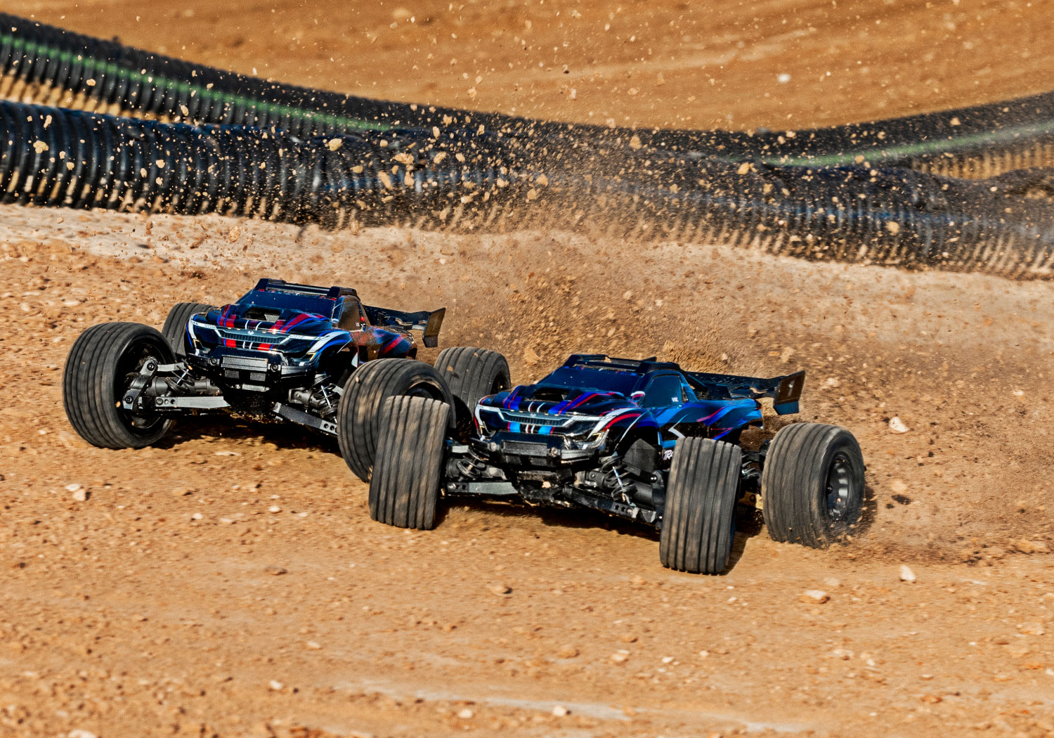An action shot of the Mini XRT Ready to Run with Battery and Charger (Blue) (TRA108076-1-BLUE).