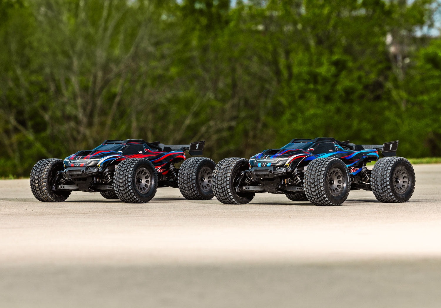 An action shot of the Mini XRT Ready to Run with Battery and Charger (Blue) (TRA108076-1-BLUE).