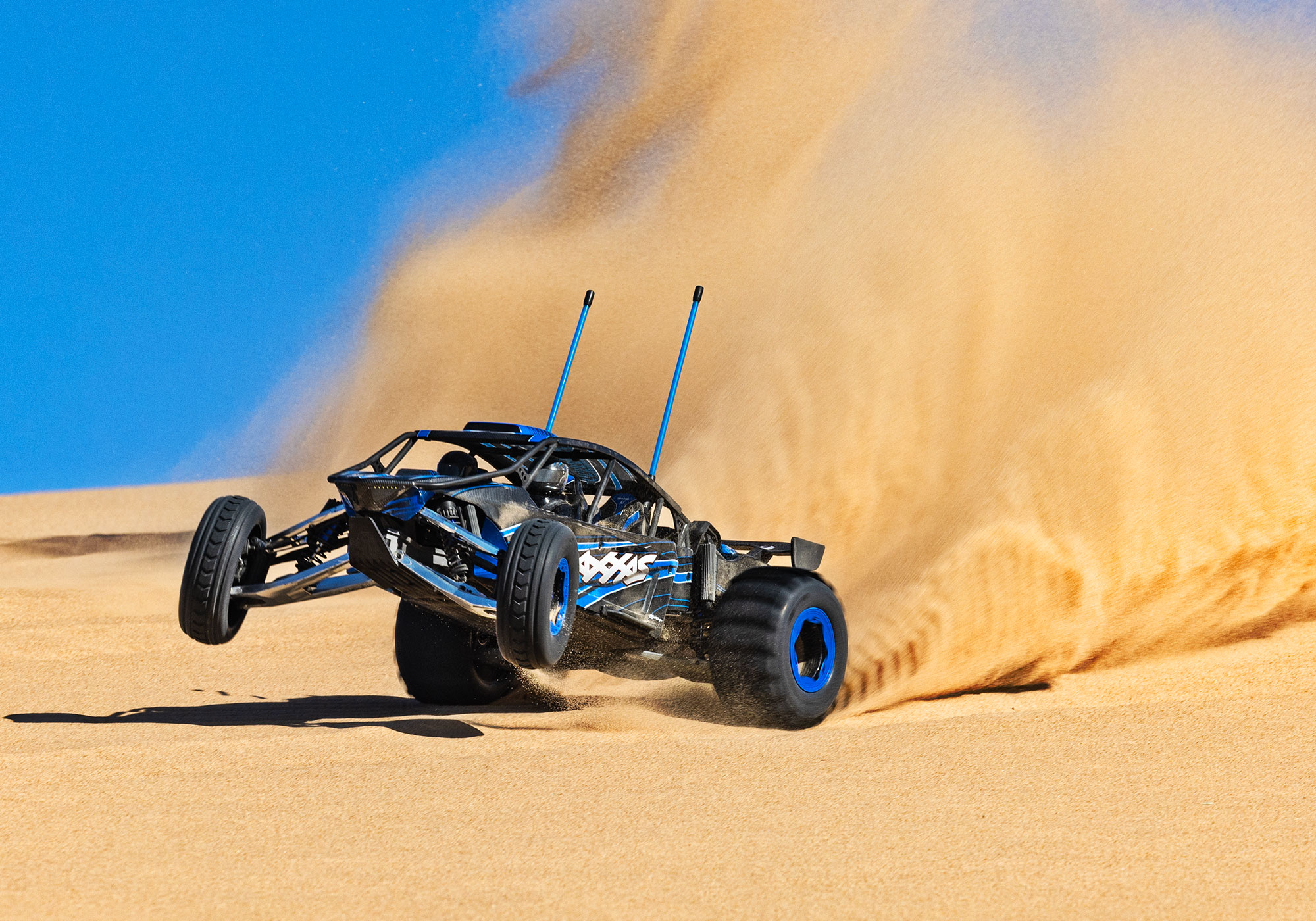 An action shot of the Funco Motorsports Pro Scale Sand Car Ready to Run (Blue) (TRA109076-4-BLUE).