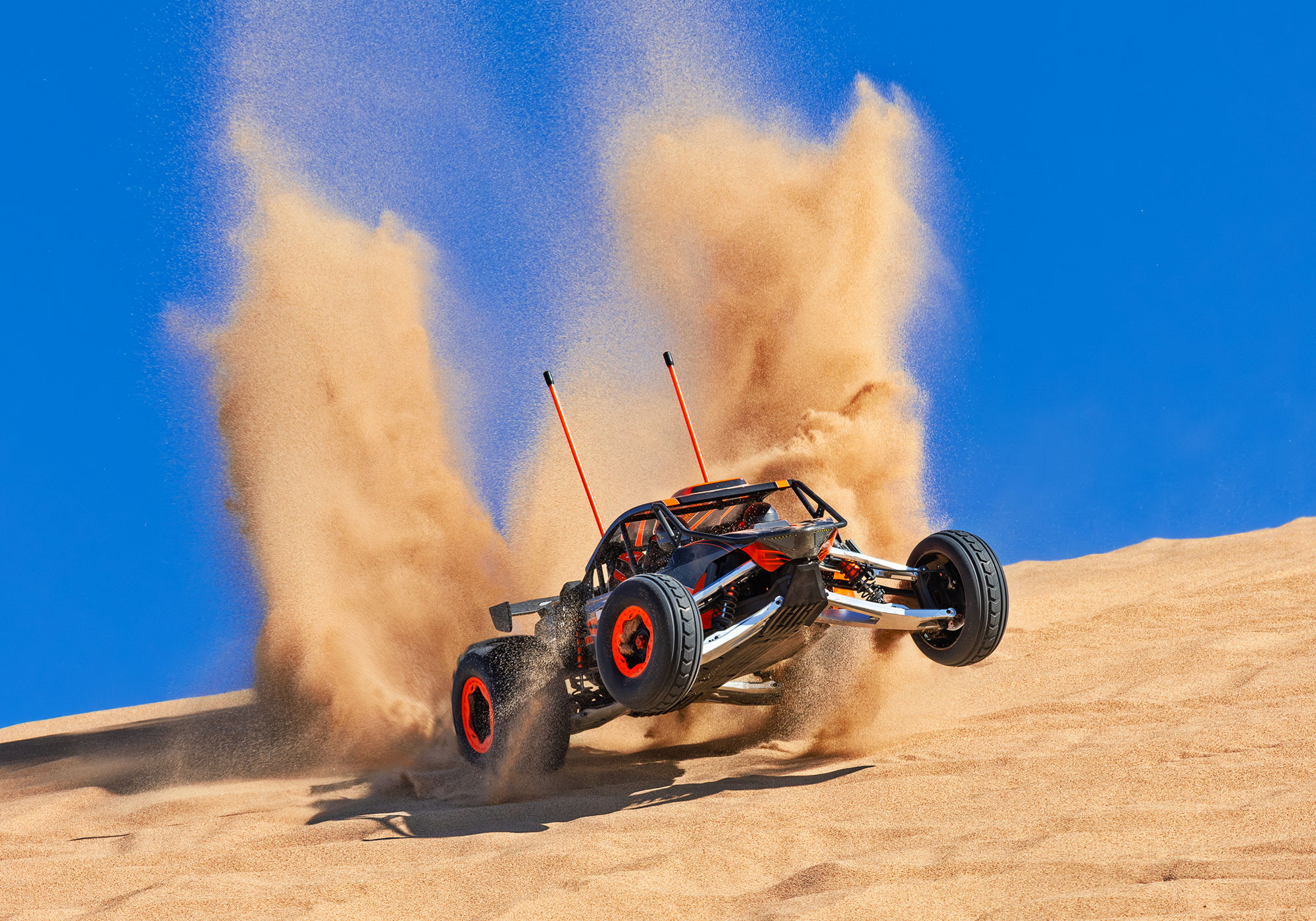 An action shot of the Funco Motorsports Pro Scale Sand Car Ready to Run (Orange) (TRA109076-4-ORNG).