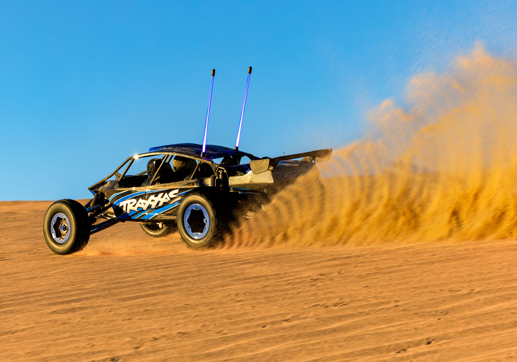 An action shot of the Funco Motorsports Pro Scale Sand Car Ready to Run (Orange) (TRA109076-4-ORNG).