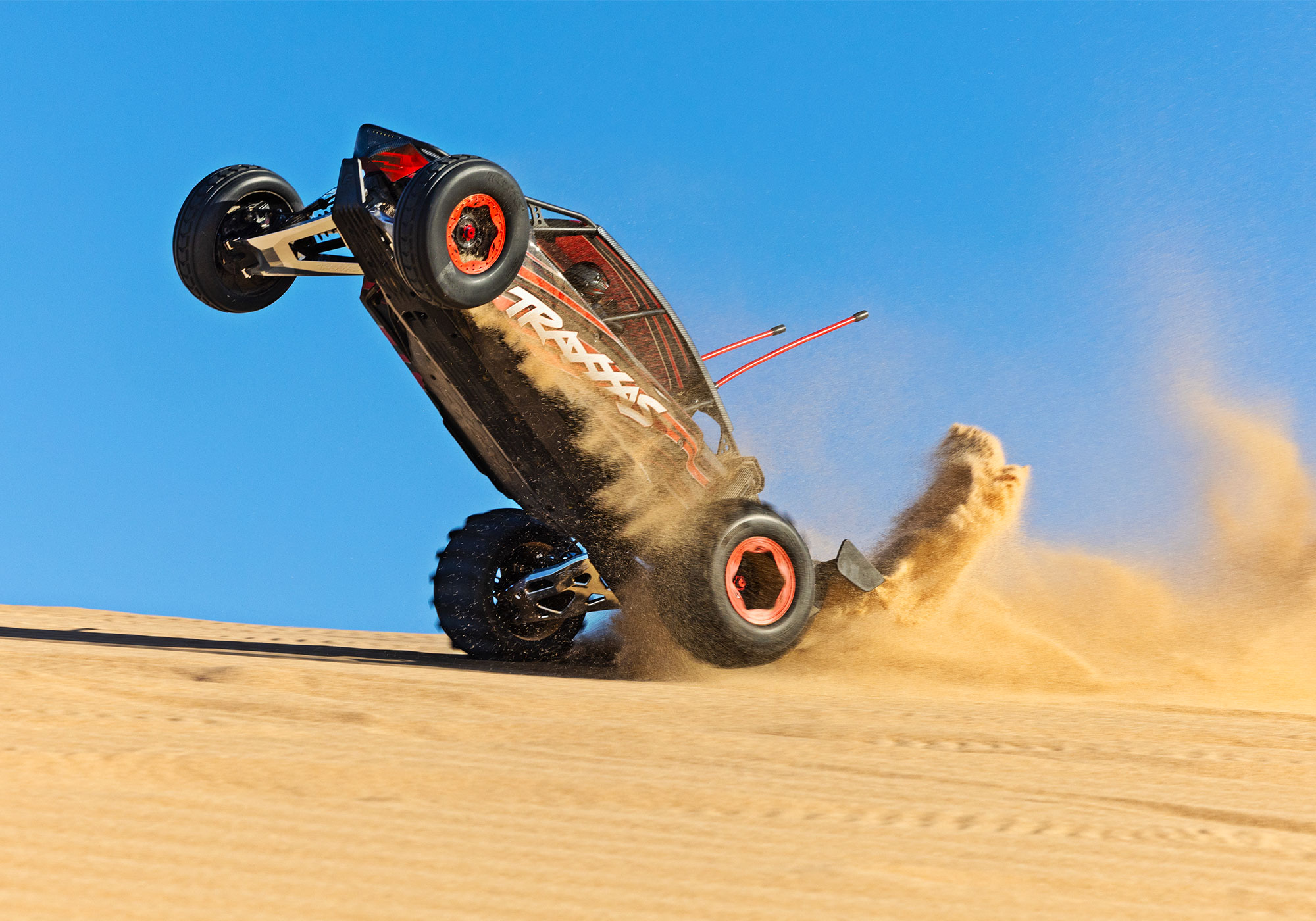 An action shot of the Funco Motorsports Pro Scale Sand Car Ready to Run (Orange) (TRA109076-4-ORNG).