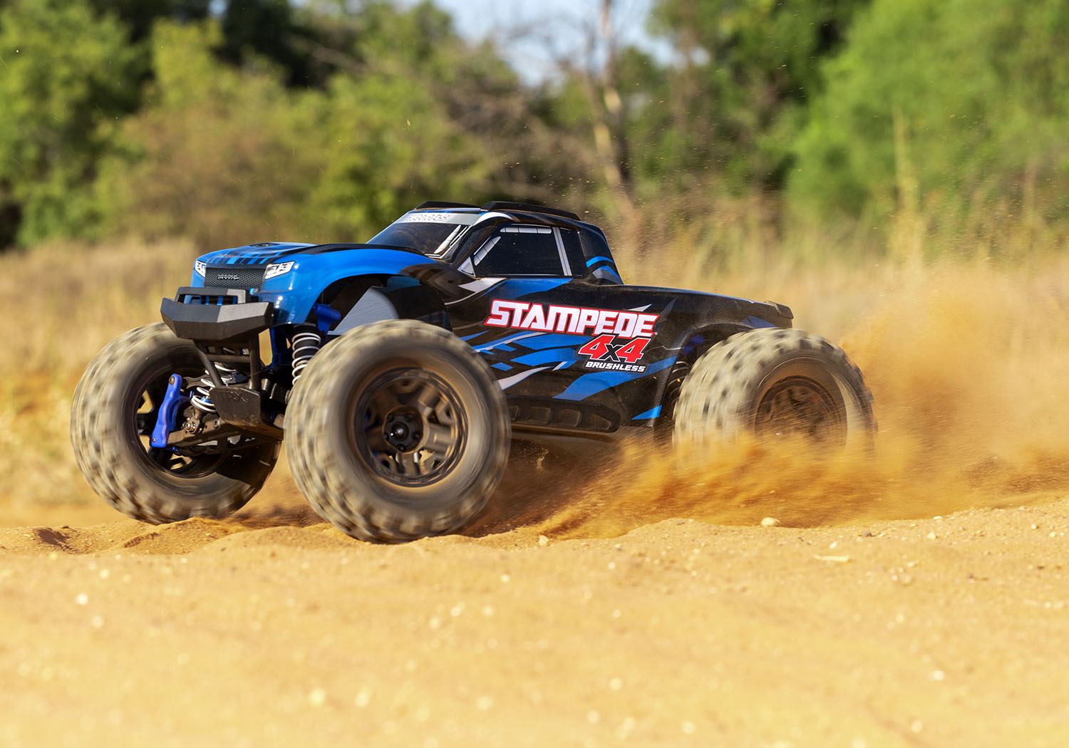 An action shot of the 1/10 Stampede 4x4 BL-2S Ready to Run (Blue) (TRA67154-4-BLUE).