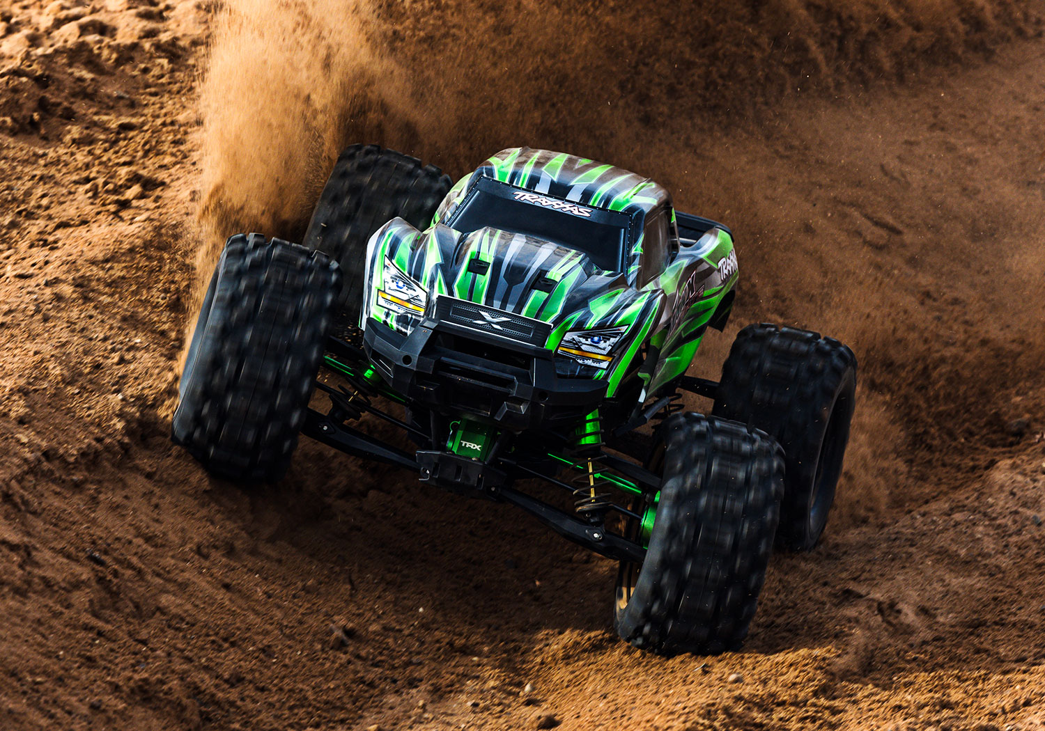 An action shot of the X-Maxx 8S Ultimate Ready to Run (Blue) (TRA77097-4-BLUE).