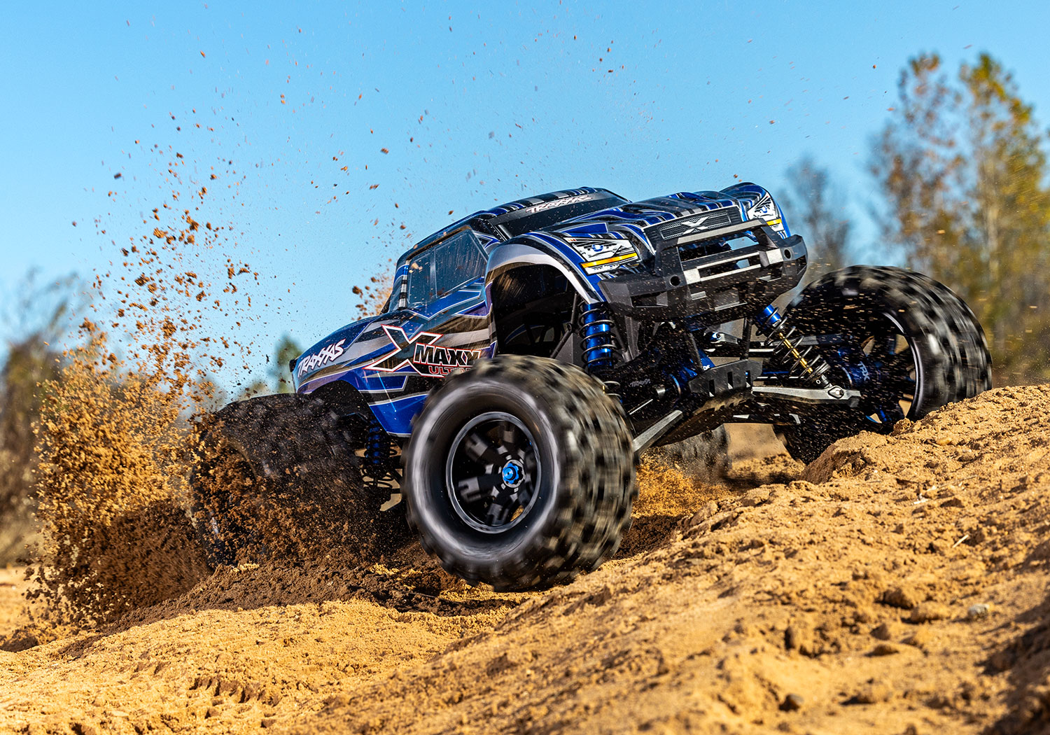 An action shot of the X-Maxx 8S Ultimate Ready to Run (Blue) (TRA77097-4-BLUE).
