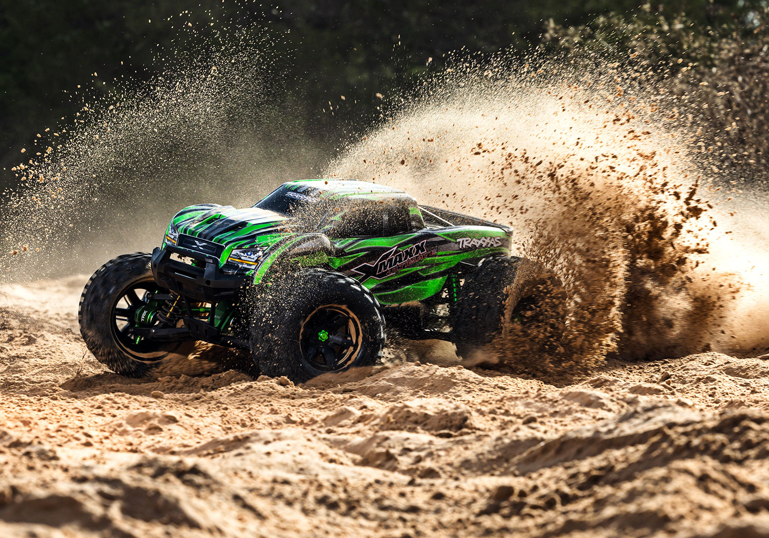 An action shot of the X-Maxx 8S Ultimate Ready to Run (Blue) (TRA77097-4-BLUE).
