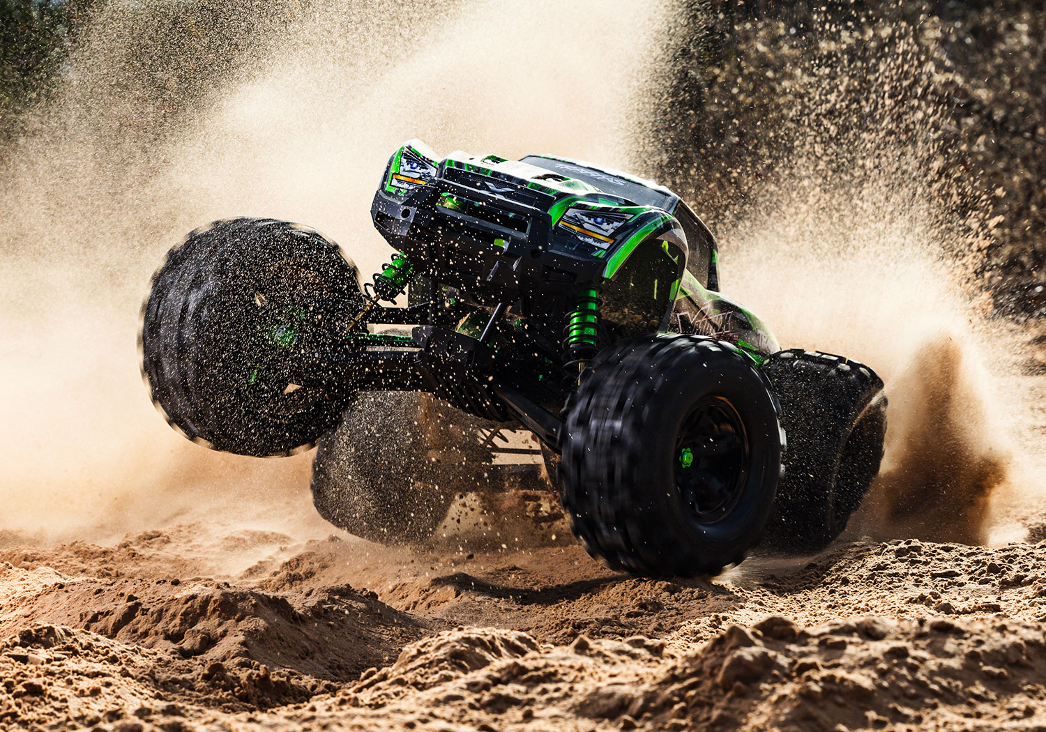 An action shot of the X-Maxx 8S Ultimate Ready to Run (Blue) (TRA77097-4-BLUE).