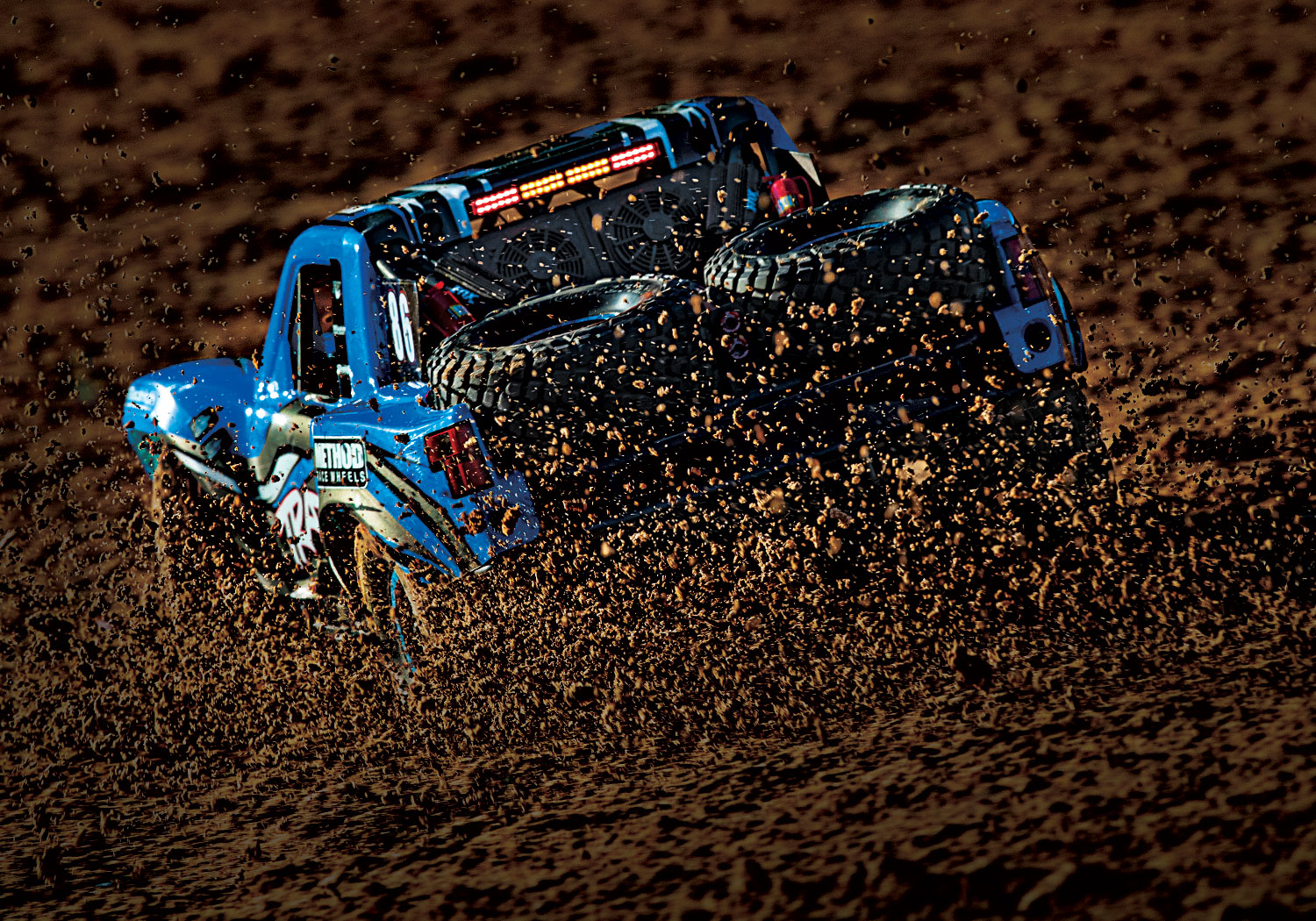 An action shot of the 1/7 Unlimited Desert Racer Ready to Run (Rigid) (TRA85086-4-RGD).