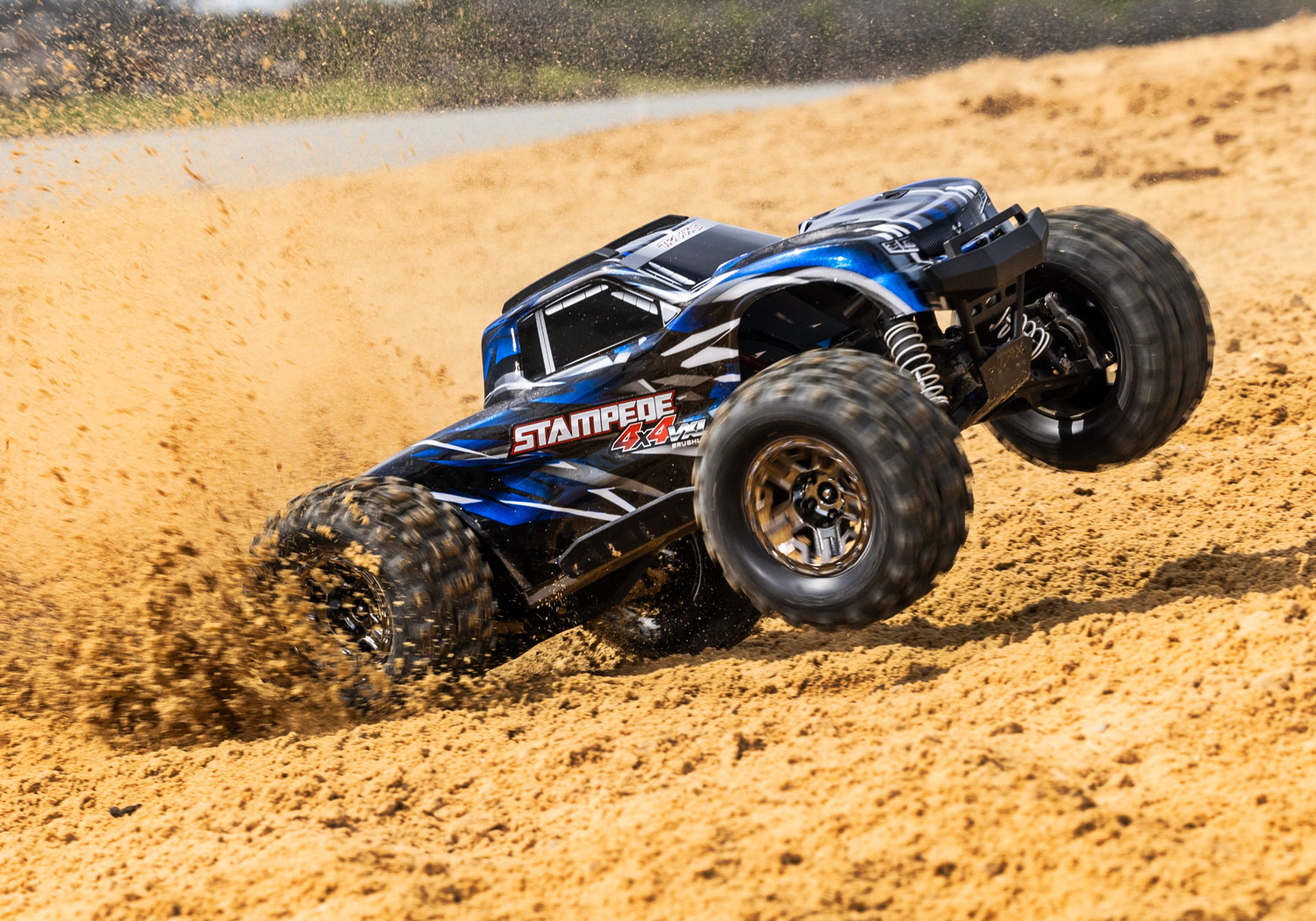 An action shot of the 1/10 Stampede 4x4 VXL with 540XL Motor Ready to Run (Green) (TRA90376-4-GRN).