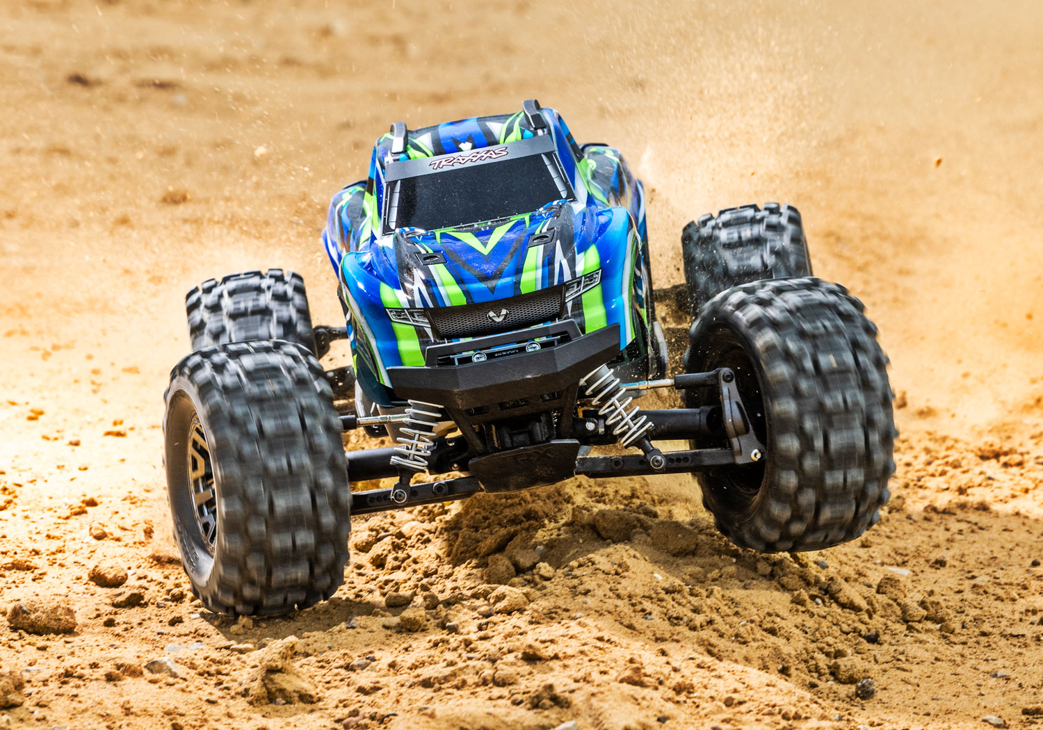 An action shot of the 1/10 Stampede 4x4 VXL with 540XL Motor Ready to Run (Green) (TRA90376-4-GRN).