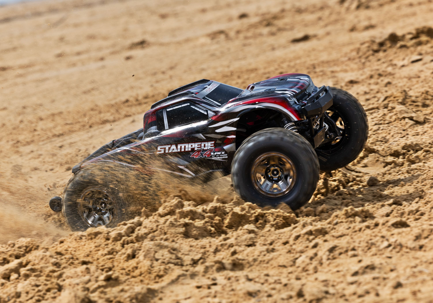 An action shot of the 1/10 Stampede 4x4 VXL with 540XL Motor Ready to Run (Red) (TRA90376-4-RED).