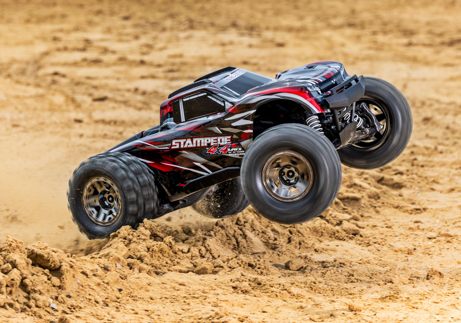 An action shot of the 1/10 Stampede 4x4 VXL with 540XL Motor Ready to Run (Red) (TRA90376-4-RED).